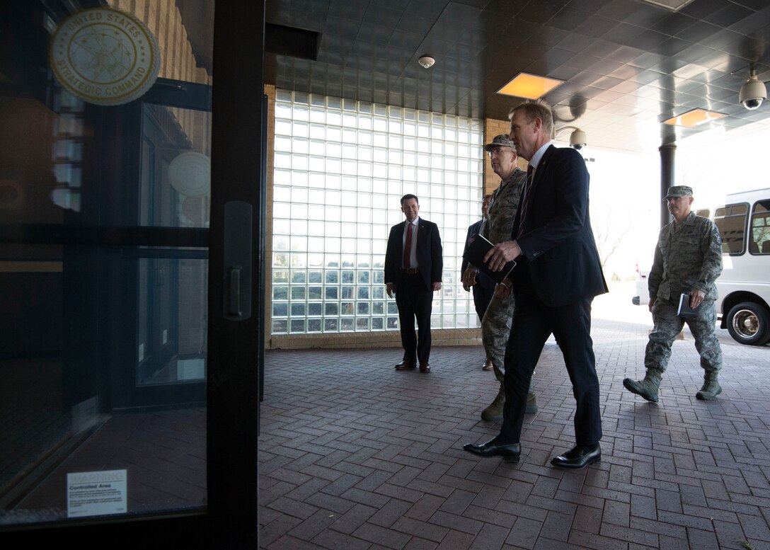 U.S. Air Force Gen. John Hyten, commander of U.S. Strategic Command (USSTRATCOM), and Deputy Secretary of Defense Patrick Shanahan arrive at USSTRATCOM headquarters, Offutt Air Force Base, Neb., April 19, 2018.  During his visit, Shanahan met with USSTRATCOM leadership to discuss nuclear command and control processes and 21st century strategic deterrence. This was Shanahan’s first visit to USSTRATCOM as deputy secretary of defense.  One of nine Department of Defense unified combatant commands, USSTRATCOM has global missions assigned through the Unified Command Plan that include strategic deterrence, space operations, cyberspace operations, joint electronic warfare, global strike, missile defense, intelligence, and analysis and targeting.