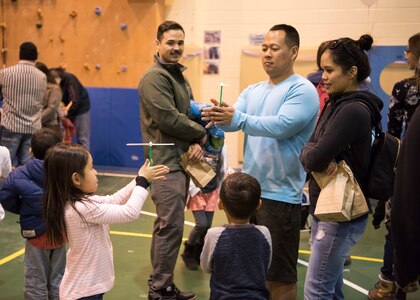 Children participate with their parents in various activities during the Month of the Military Child Carnival at Joint Base Elmendorf-Richardson’s 2Rivers Youth Center, April 13, 2018. The event consisted of games, cotton candy, popcorn, face painting and more. April is the Month of the Military Child, highlighting the significant role military children play in the armed forces community.