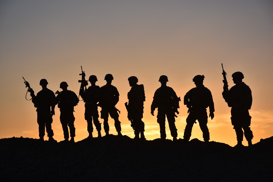 Soldiers from Task Force Stalwart, composed of soldiers from 1st Battalion, 41st Infantry Regiment, 2nd Brigade Combat Team, 4th Infantry Division, pose for a group photo in Afghanistan.