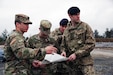 group of Soldiers with map