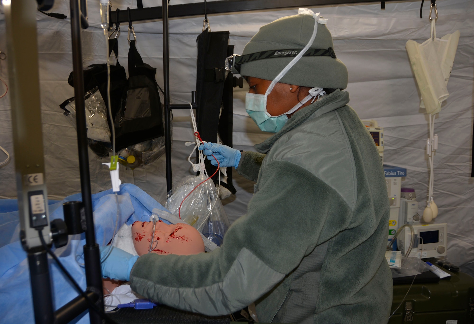 Maj. Stacy Carr, nurse anesthetist, 81st Medical Group, Keesler Air Force Base, Miss., prepares a simulated patient for surgery April 19, 2018 during the Expeditionary Medical Support (EMEDS) field confirmation exercise here. The confirmation exercise is evaluating the tactics, techniques and procedures of EMEDS operations during a domestic U.S. contingency such as a natural disaster. (U.S. Air Force photo by Mary McHale)