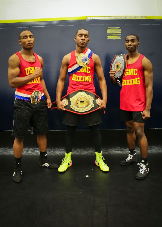 Lance Cpl. Keandre Blackshire, Cpl. Malik Collins, and Cpl. Oubigee Jones fought in the Marine Corps and Chevrolet Freedom Fight exhibition aboard Marine Corps Base Camp Lejeune April 14. The Marines were able to represent the Marine Corps Boxing Team in the exhibition match and had the opportunity to fight in front of retired and current boxing legends. The Marines are Administrative Specialists with the Installation Personnel Administrative Center.