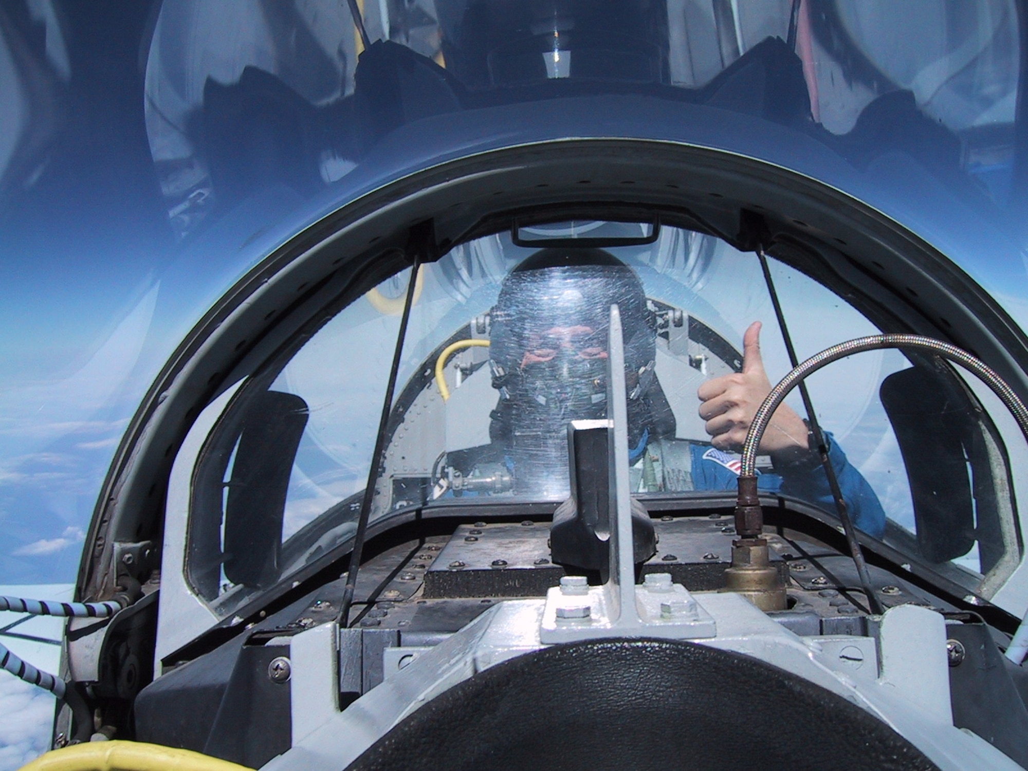 Then-Maj. (Dr.) Josef Schmid, a reserve mobilization assistant to the Air Force Surgeon General, and civilian NASA flight surgeon, flies the T-38 in May 2002. Because of his reserve and civilian roles, Schmid is familiar with the rigors of flight and is able to administer care to both Airmen and astronauts. (Courtesy photo)