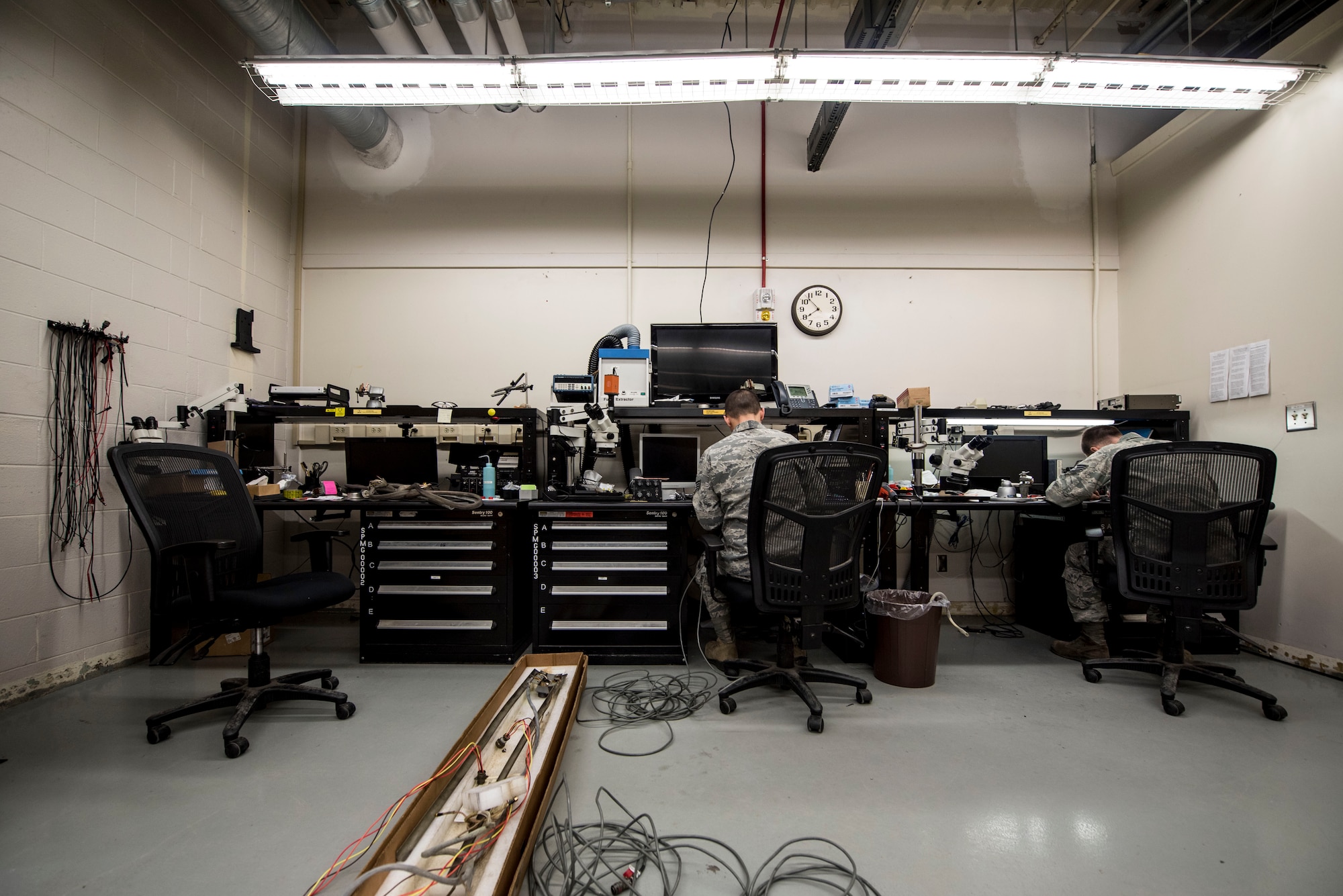 U.S. Air Force Staff Sgt. Alexander Creznic, left, and Staff Sgt. Brandon Henry, 20th Maintenance Group Air Force Repair Enhancement Program (AFREP) technicians, repair F-16 Fighting Falcon components at Shaw Air Force Base, S.C., April 20, 2018.