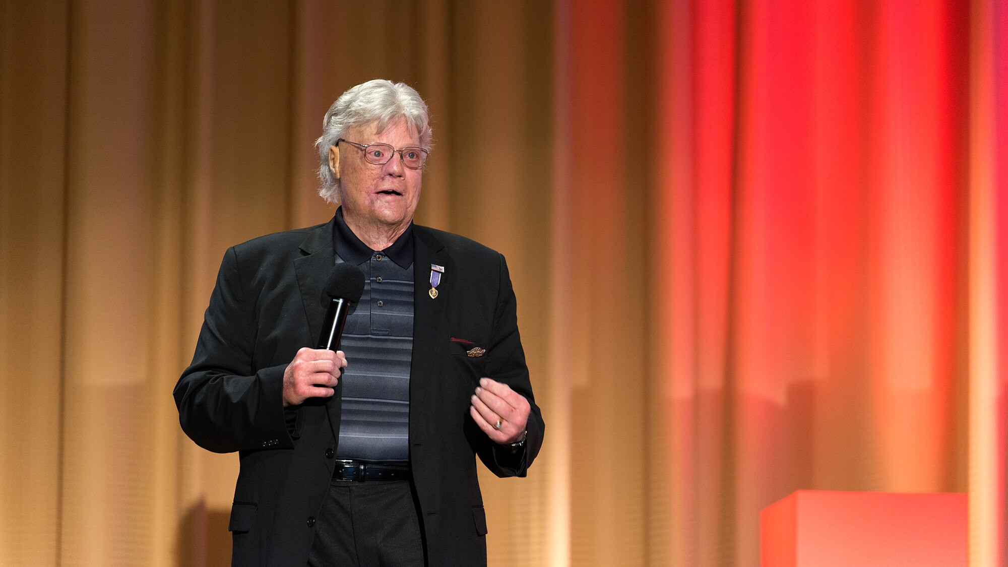 David Roever, a Vietnam War veteran and Purple Heart recipient, speaks during the Leaders Inspiring for Tomorrow seminar hosted by MacDill Air Force Base, Fla., April 19, 2018. Roever shared his tragic story of survival and perseverance as a way to impart hope in the face of insurmountable obstacles. LIFTx brought together 10 diverse speakers from around the country who shared their stories of leadership, inspiration, innovation and resiliency.