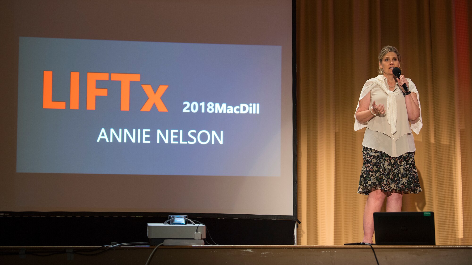 Annie Nelson, a former sports broadcaster, speaks during the Leaders Inspiring for Tomorrow seminar hosted by MacDill Air Force Base, Fla., April 19, 2018. Nelson shared her story of combating post-traumatic stress in hopes to raise awareness on the recovery process of such condition. LIFTx brought together 10 diverse speakers from around the country who shared their stories of leadership, inspiration, innovation and resiliency.