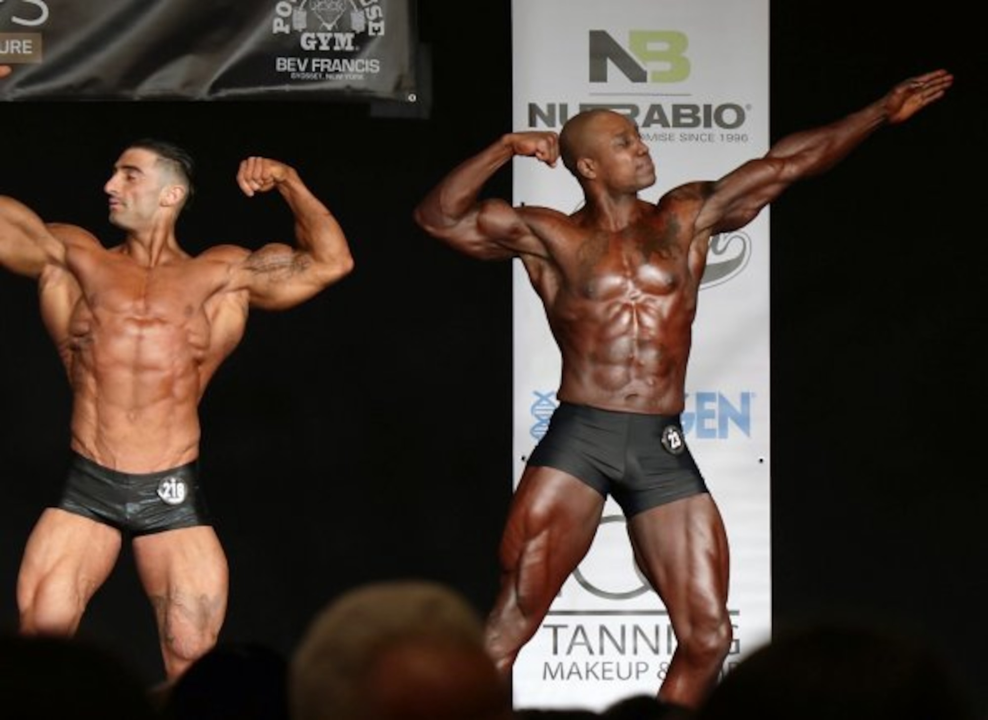 174th Infantry Brigade Soldiers Staff Sgt. Jamie Kedrowicz (right) and Capt. Kevon Reid (left) square off at the 2018 Steve Stone Metropolitan Bodybuilding Championships in Teaneck, New Jersey Mar. 31. Staff Sgt. Kedrowicz and Capt. Reid finished first and second in the Men's Classic Physique division. (Courtesy Photo) (Photo Credit: U.S. Army)
