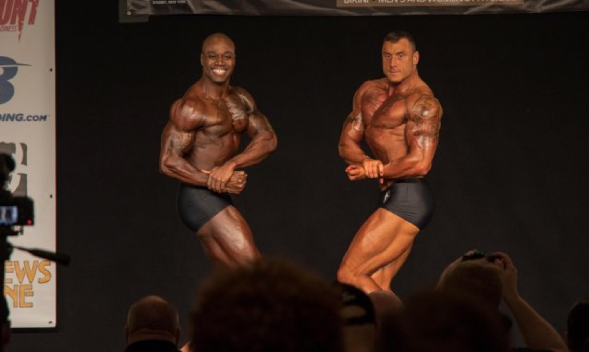 174th Infantry Brigade Soldiers Staff Sgt. Jamie Kedrowicz (right) and Capt. Kevon Reid (left) square off at the 2018 Steve Stone Metropolitan Bodybuilding Championships in Teaneck, New Jersey Mar. 31. Staff Sgt. Kedrowicz and Capt. Reid finished first and second in the Men's Classic Physique division. (Courtesy Photo) (Photo Credit: U.S. Army)