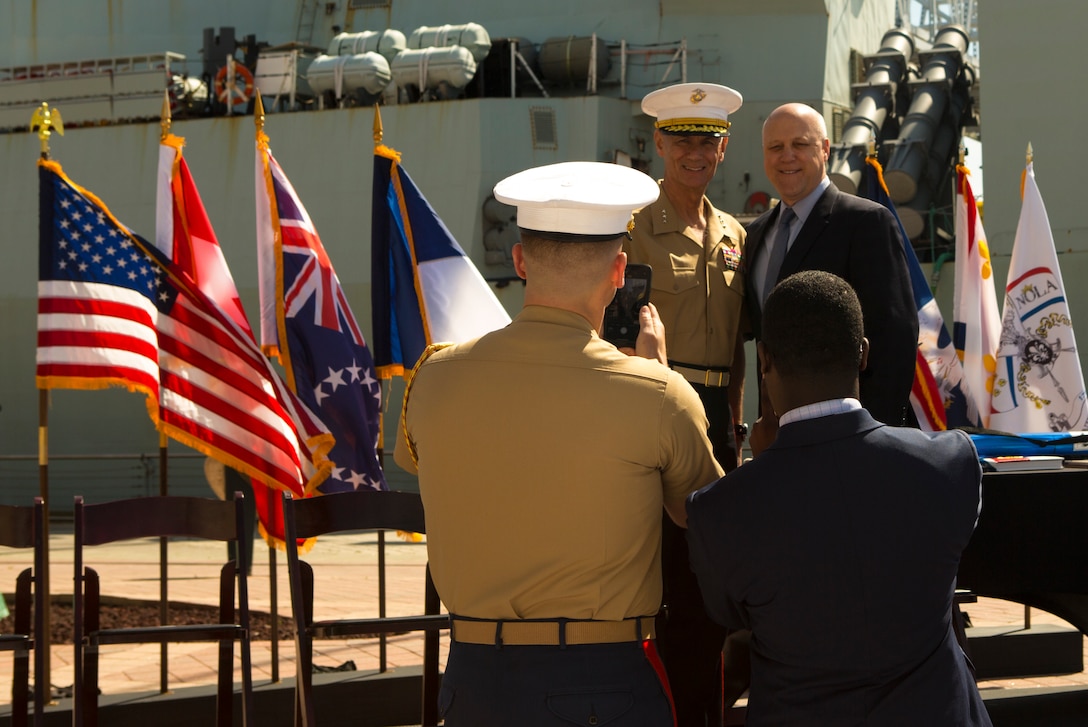 Lt. Gen. Rex C. McMillian (left), commander of Marine Forces Reserve and Marine Forces North,  and Mitch Landrieu (right), mayor of New Orleans, pose for a photo during the mayoral welcome for Navy Week at the Port of New Orleans, April 20, 2018. The celebration is an opportunity for citizens of New Orleans and surrounding area to meet service members and witness the latest capabilities of today’s maritime service. (U.S. Marine Corps photo by Lance Cpl. Melany Vasquez/Released)