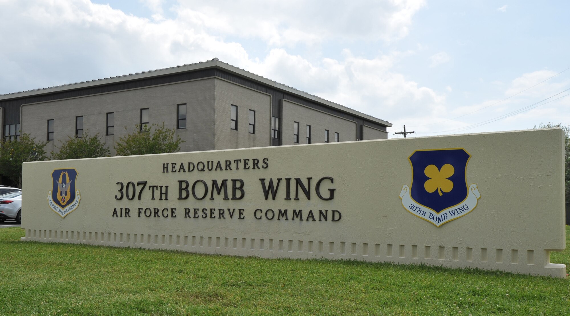The 307th Bomb Wing Headquarters building sits behind its newly refinished sign on Barksdale Air Force Base, La., April 18, 2018.
