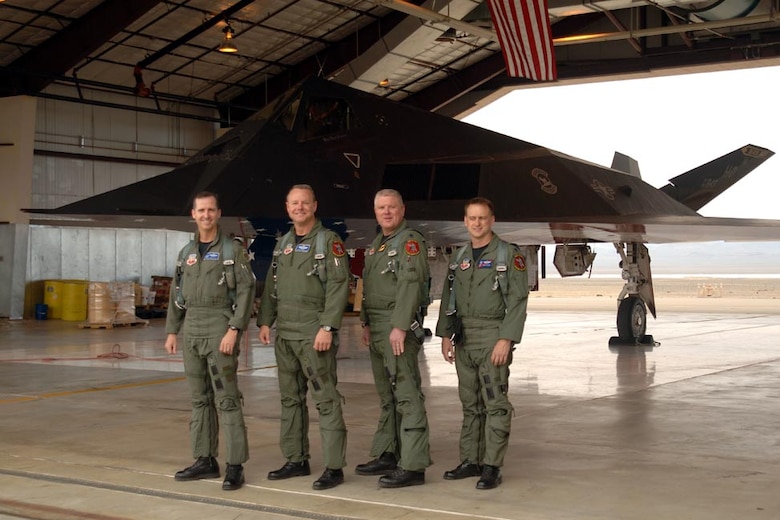 From left: retired Col. Jack Forsythe, Lt. Col. Mark Dinkard, 49th Operations Group deputy, Lt. Col. Todd Flesch, 8th Fighter Squadron commander, Lt. Col. Ken Tatum, 9th Fighter Squadron commander, after retiring the last four F-117s to Tonopah Air Force Base, Nev. April 22, 2008. (Courtesy photo)