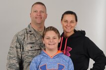 From left, Lt. Col. Jerrod Duggan, 341st Maintenance Group vice commander, his son Mason, and wife Kimberly, pose for a portrait April 2, 2018, at Malmstrom Air Force Base, Mont.