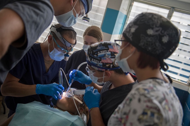U.S. military dentist treat a patient in Guatemala.