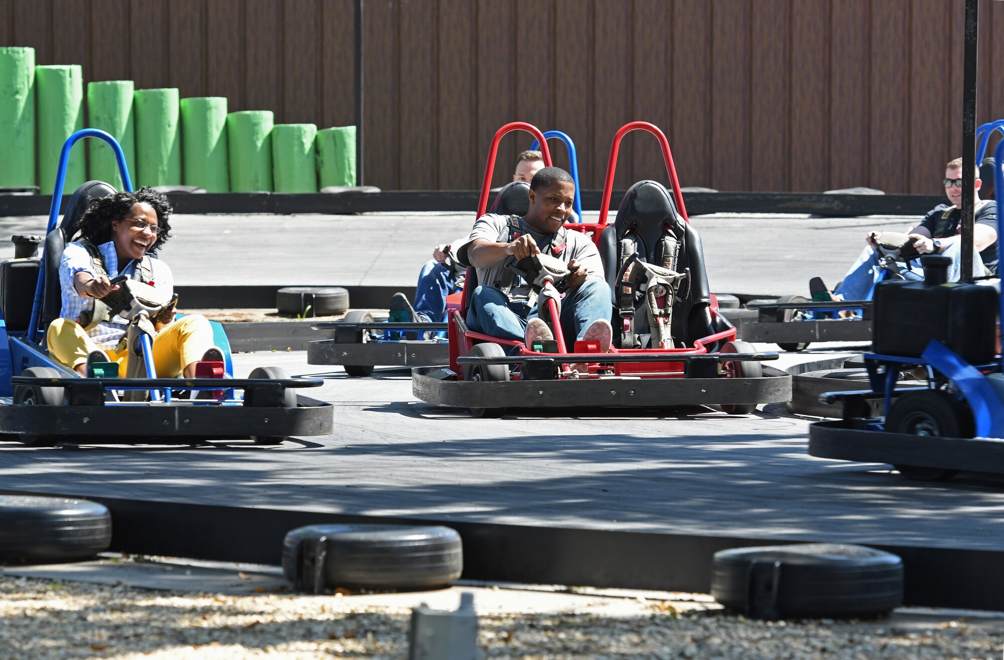Members of the 81st Training Wing commander’s support staff ride go-carts for Dragon Chat at Big Play in Biloxi, Mississippi, April 19, 2018. Dragon Chat consisted of Airmen participating in small group discussions within their units to focus on building resiliency and team building initiatives. (U.S. Air Force photo by Kemberly Groue)
