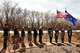 Col. Jeremy Thiel, 319th Air Base Wing vice commander, stands beside the Grand Forks Air Force Base Ambassadors at a bench dedication ceremony April 20, 2018, on Grand Forks AFB, N.D. The ceremony honored of the late Marijo Shide, a fellow ambassador who passionately served her community. (Air Force photo by Airman 1st Class Elora J. Martinez)