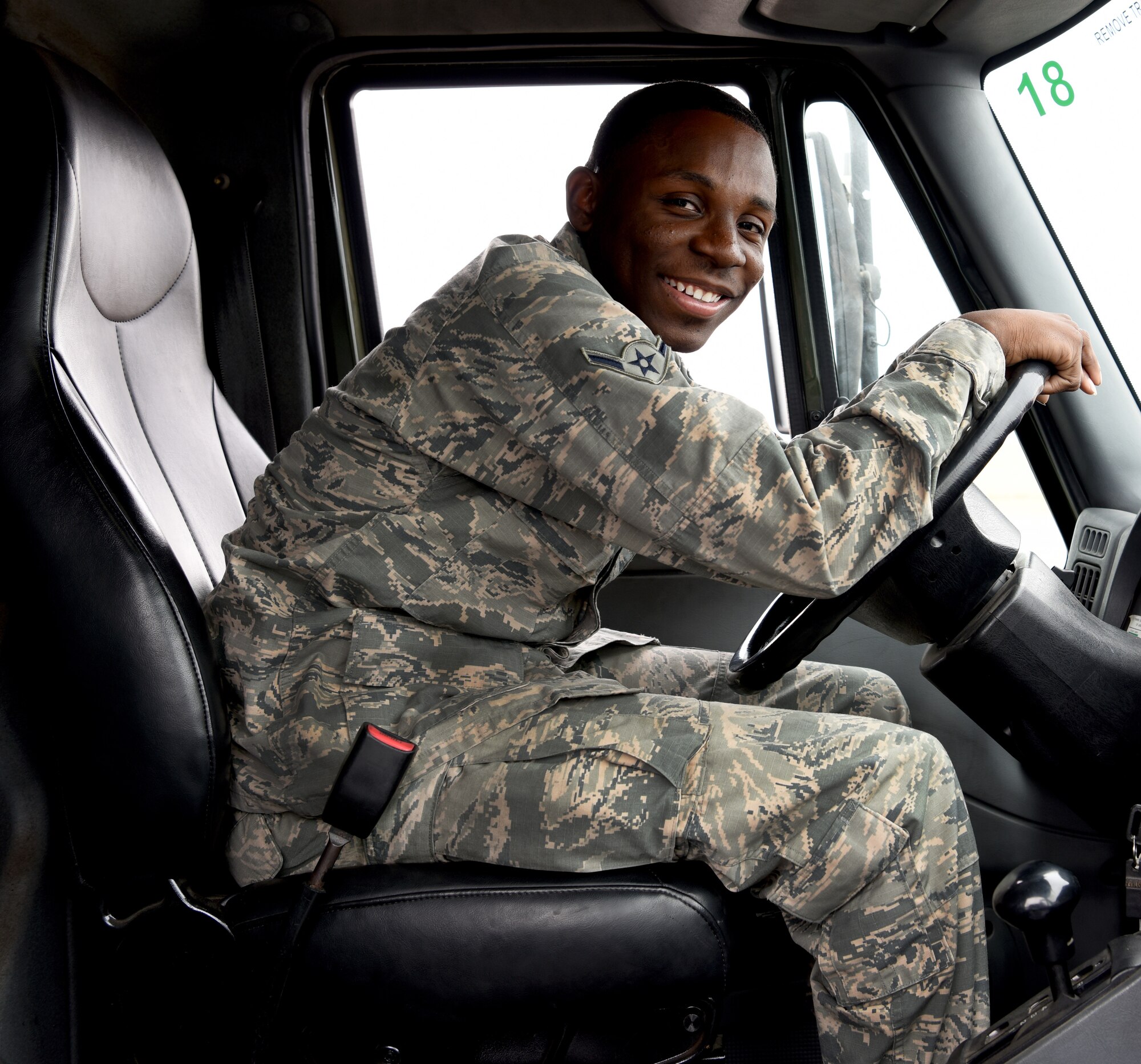 Airman Johnny Jackson, 56th Logistics Readiness Squadron fuels operations distributor, smiles for a portrait in the driver’s seat of his fuel truck April 19, 2018, at Luke Air Force Base, Ariz. Jackson, along with three other fuels operations distributors, won the 2018 Petroleum, Oil, and Lubricants “Roadeo” competition, wherein competitors raced to complete a series of timed objectives with a fuel truck. (U.S. Air Force photo by Airman 1st Class Aspen Reid)