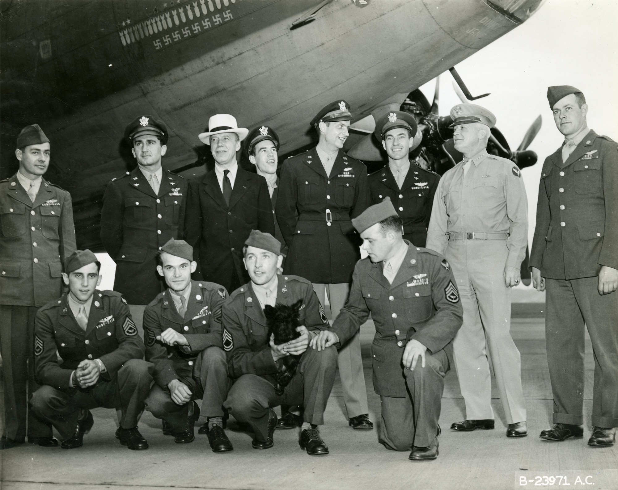 Memphis Belle crew at their first stop on the war bond tour, Washington, DC, on June 16, 1943.  Commanding General of the USAAF Henry “Hap” Arnold (standing, second from the right) and Undersecretary of War Robert Patterson (standing, third from left) are pictured with them.