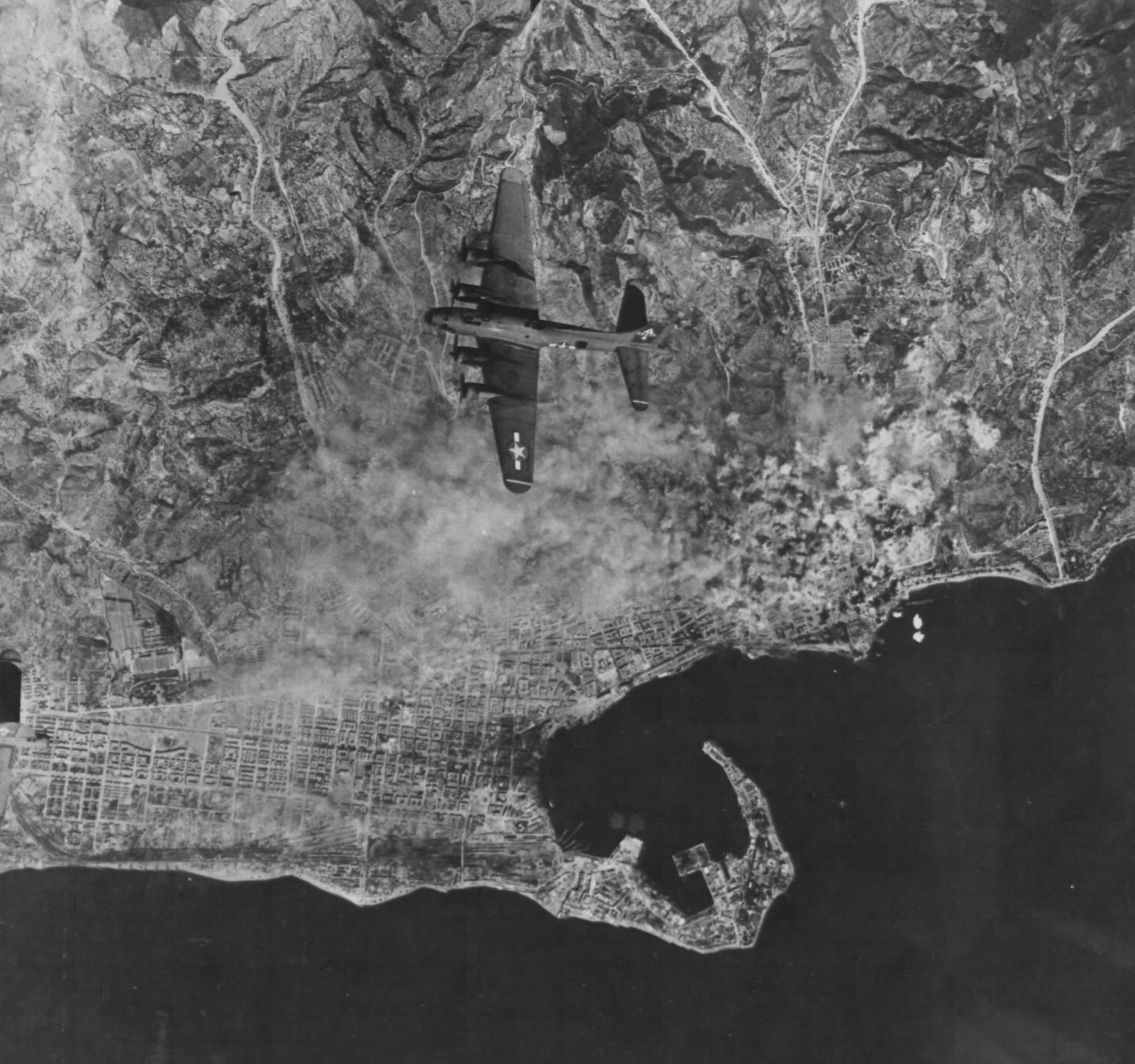 B-17 bombing the port at Messina, Sicily.