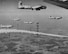 Eighth Air Force B-17s bombing the railroad yards in Donauworth, Germany, in April 1945.  The smoke is from a marker signaling the bomb drop.