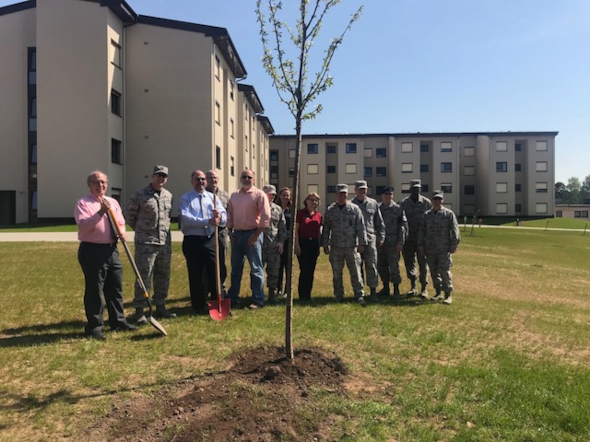 86th Airlift Wing leadership and Host Nation Forest Authorities participate in a tree planting ceremony on Ramstein Air Base, Germany, April 20, 2018.