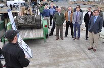 IMAGE: DAHLGREN, Va. (March 28, 2018) - Navy scientist Ben Wheeler briefs visitors on an engagement system integral to the Surface and Expeditionary Warfare Mission Module technologies and weapons toe integrated on the developmental Common Unmanned Surface Vehicle (CUSV). The mission module comprises engagement system technology developed at Naval Surface Warfare Center Dahlgren Division (NSWCDD) coupled with a Battle Management System that controls munitions such as the Longbow Hellfire Missile. The event comes on the heels of a cooperative research and development agreement that NSWCDD signed with Textron Systems who makes the CUSV. The Navy and Textron Systems plan to prove that direct and indirect fire capability with a gunfire demonstration later this year, followed by a live missile shoot in 2019. (U.S. Navy photo/Released)