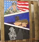 Prevention Summit at the Fort Sam Houston Community Center April 19, a painting is displayed depicting the devastation caused by sexual assault amongst military service members. The artist, Sandra Hocking, from the 470th Military Intelligence Brigade, titled this painting “Shattered Trust.”