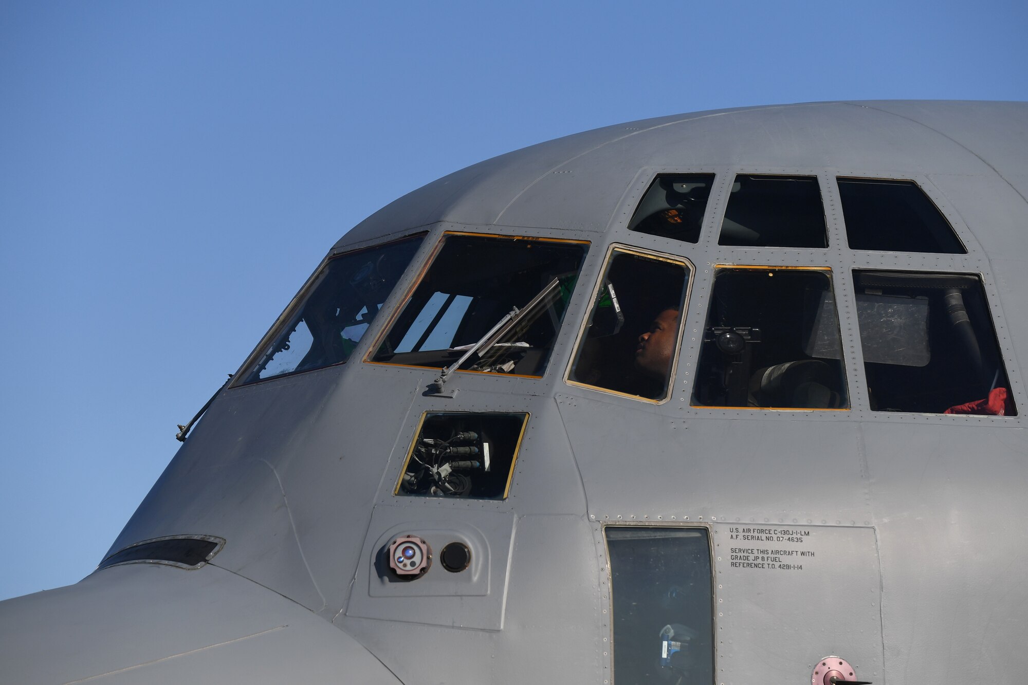 U.S. Air Force Captain prepares a C-130J for take-off
