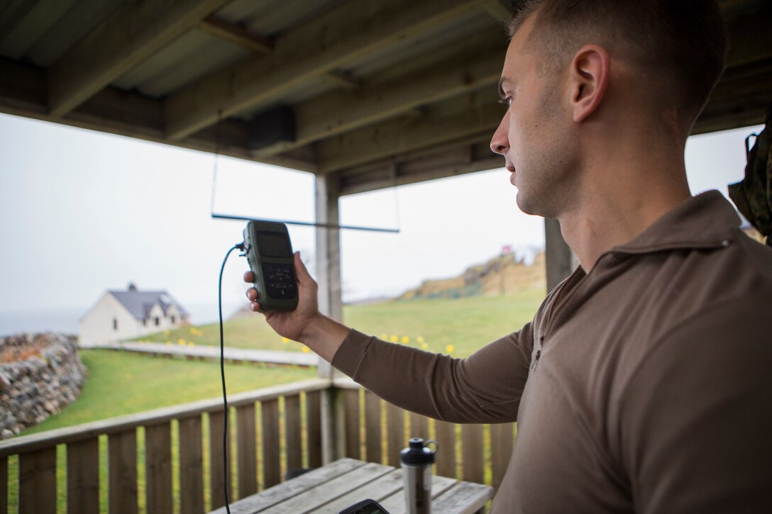 Sgt. Michael Peers, a firepower control team chief with 4th Air Naval Gunfire Liaison Company, Force Headquarters Group, performs an operations check to make sure his vector 21-Bravo is sending the correct information to dagger system, in Durness, Scotland, April 22, 2018.