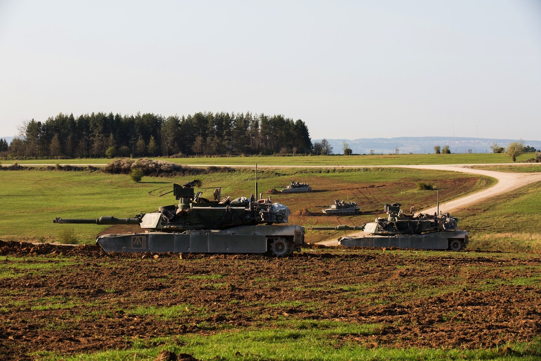 Soldiers maneuver an M1A2 Abrams tank during the Combined Resolve X training exercise at Grafenwoehr, Germany.