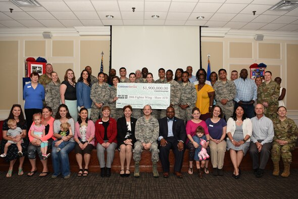Team Shaw volunteers pose for a group photo during an annual volunteer recognition ceremony at Shaw Air Force Base, S.C., April 19, 2018.