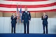 Maj. Gen. Mary O'Brien, 25th Air Force commander, and Col. Larry Broadwell, former 9th Reconnaissance Wing commander, clap for Col. Andrew Clark, 9th RW commander, during the change of command at Beale Air Force Base, California, April 13, 2018. Clark will be responsible for more than 7,000 Airmen and civilians as well as the Air Force's entire high-altitude reconnaissance fleet of RQ-4 Global Hawk and U-2 Dragon lady aircraft.