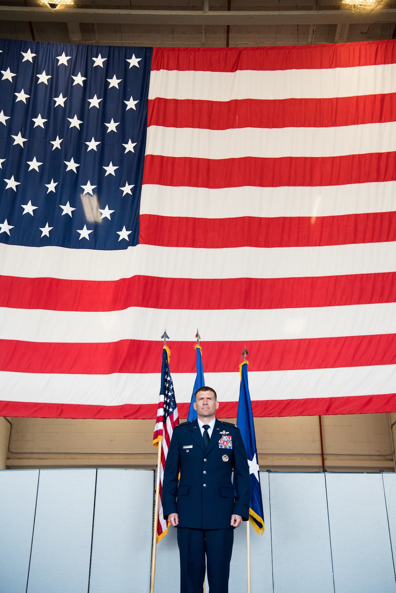 Col. Andrew Clark, 9th Reconnaissance Wing commander, stands at attention awaiting his first salute as the new commander of the 9th RW Beale Air Force Base, California, April 13, 2018. The 9th RW is the only intelligence, surveillance and reconnaissance wing in the Department of Defense.
