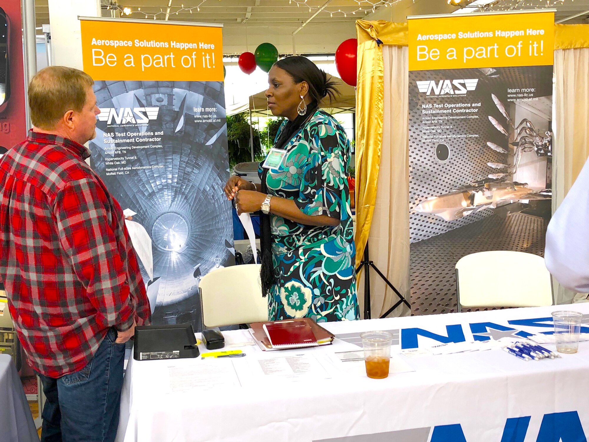Cindy Dixon, right, speaks with an attendee of the Franklin County Chamber of Commerce Business Expo April 5 at the Monterey Station in Cowan. Dixon is an AEDC acquisition professional at Arnold Air Force Base with the Test Operations and Support contractor. She provides instruction to local and regional businesses on the processes of doing business with the Base. (Courtesy NAS photo by Bob Pullen)
