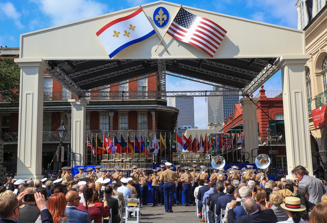 Marine Corps Band New Orleans performs the opening ceremony for service members and distinguished visitors in celebration of the New Orleans Tricentennial ceremony in the French Quarter, New Orleans, April 21, 2018. The celebration was an opportunity for service members, distinguished visitors, and elected officials to come together in celebration of the culture and history of New Orleans since its founding in 1718.  (U.S. Marine Corps photo by Lance Cpl. Samantha Schwoch/released)