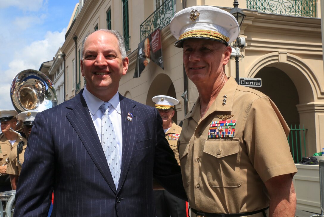 Lt. Gen. Rex C. McMillian (right), commanding general of Marine Forces Reserve and Marine Forces North, and John Bel Edwards (left), governor of Louisiana, pose for a photo following the New Orleans tricentennial ceremony in the French Quarter, New Orleans, April, 21, 2018. Service members and distinguished visitors from around the world gathered in the French Quarter to help celebrate the culture and history of New Orleans during the New Orleans Tricentennial ceremony. (U.S. Marine Corps photo by Lance Cpl. Samantha Schwoch/released)