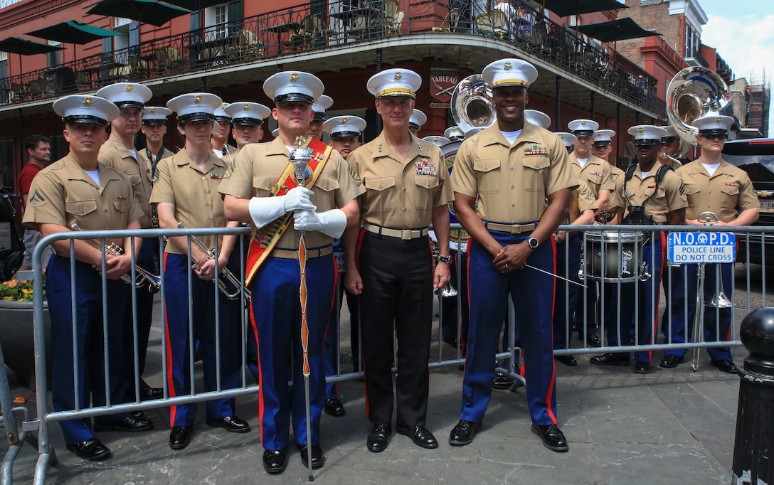 Lt. Gen. Rex C. McMillian (right), commanding general of Marine Forces Reserve and Marine Forces North, poses with the Marine Corps Band New Orleans following the New Orleans tricentennial ceremony in the French Quarter, New Orleans, April, 21, 2018. Service members and distinguished visitors from around the world gathered in the French Quarter to help celebrate the culture and history of New Orleans during the New Orleans tricentennial. (U.S. Marine Corps photo by Lance. Cpl. Samantha Schwoch/released)
