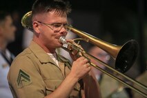 Cpl. David Linnenkamp, trombone instrumentalist with Marine Coprs Band New Orleans, performs a solo in the French Quarter in celebration of Navy Fleet week in New Orleans, April 21, 2018.
