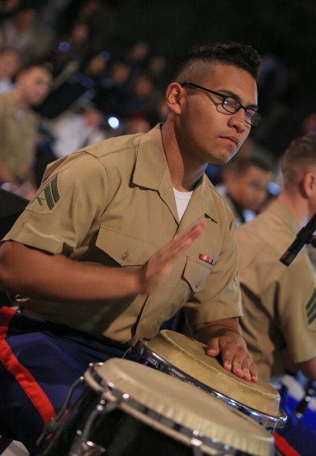 Cpl. Vicente Rodriguez, percussion instrumentalist with Marine Corps Band New Orleans, performs a solo in the French Quarter in celebration of Navy Fleet week in New Orleans, April 21, 2018. The celebration is an opportunity for citizens of New Orleans and surrounding areas to meet service members and witness the latest capabilities of today’s maritime service. (U.S. Marine Corps photo by Lance Cpl. Samantha Schwoch/released)