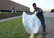 552nd Air Control Wing Commander Col. Geoffrey Weiss, left, and Vice Commander Col. Gavin Marks picked-up trash around their headquarters building on Apr. 13 for Tinker Pride Day.
