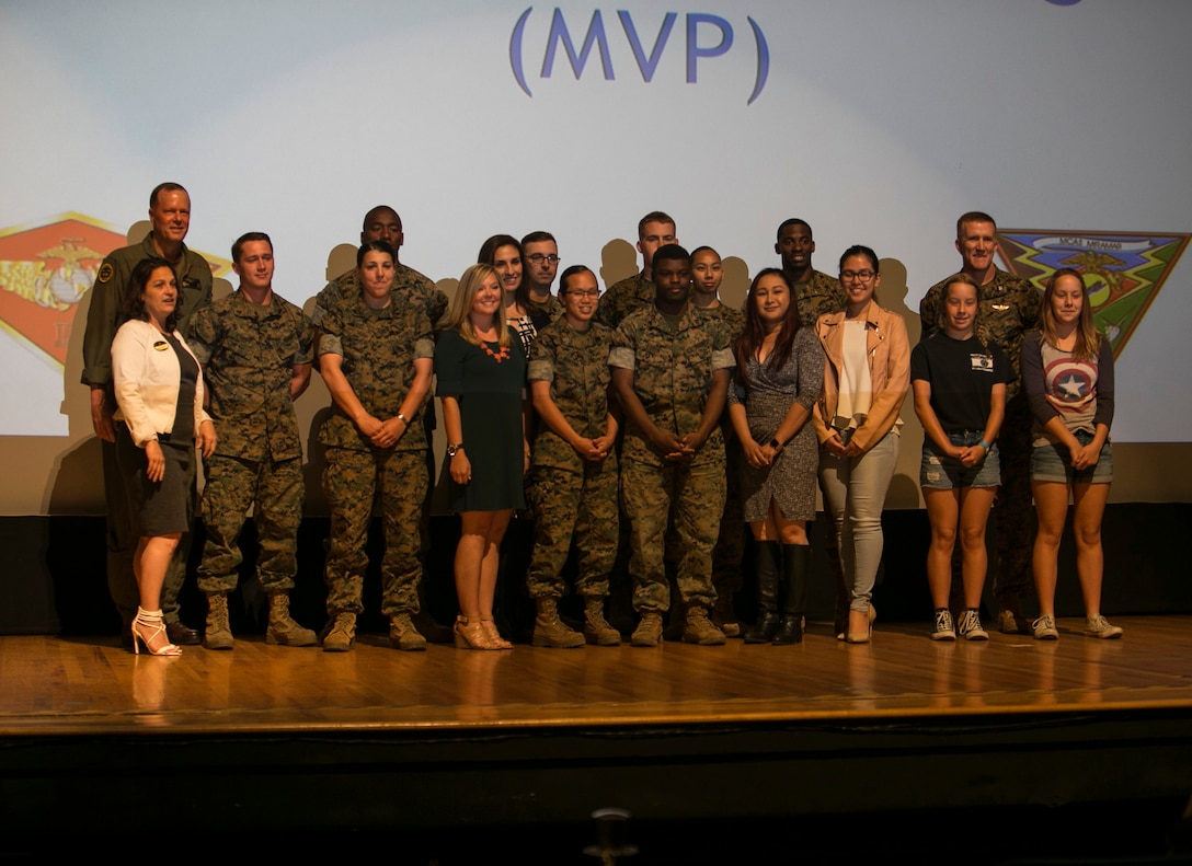 Service members, Marine Volunteer Program staff and participants of the President’s Volunteer Service Award posed for a photo during a volunteer appreciation ceremony on Marine Corps Air Station (MCAS) Miramar, Calif., April 18. MCAS Miramar and 3rd Marine Aircraft Wing leaders teamed up with the Miramar Volunteer Program and recognized Marines and Sailors who accumulated at least 100 volunteer hours during 2017. (U.S. Marine Corps Photo by Lance Cpl. Mark A. Lowe II/Released)