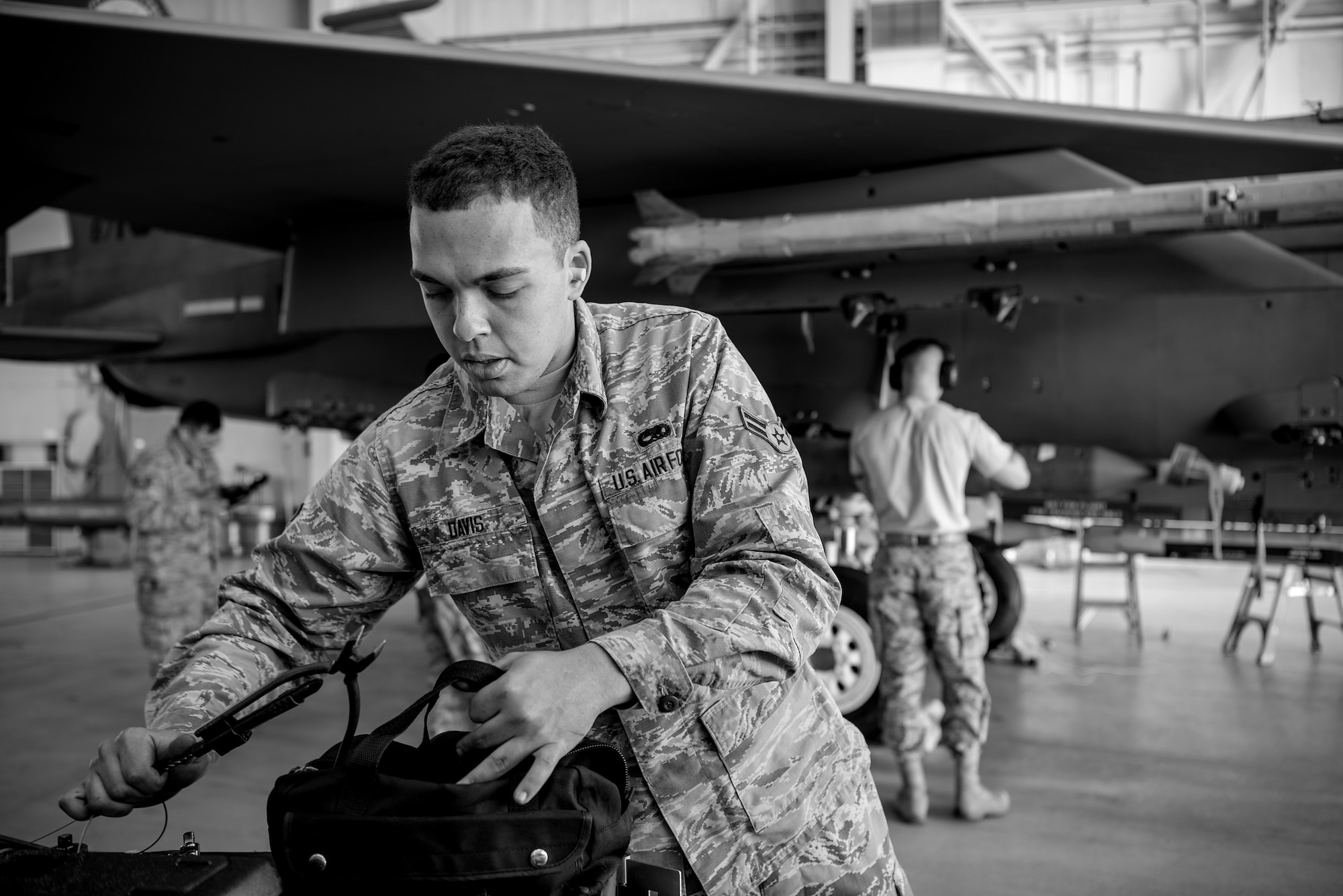 Airman 1st Class Dylan Davis, 4th Aircraft Maintenance Squadron load crew member, grabs tools during a load crew competition, April 20, 2018, at Seymour Johnson Air Force Base, North Carolina.
