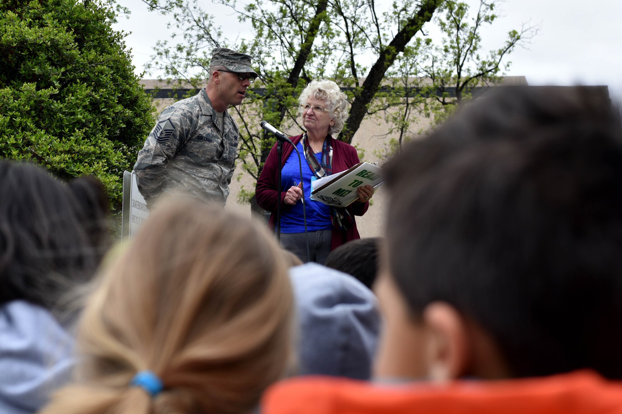 U.S. Air Force Master Sgt. Donovan Gollihar, 17th Force Support Squadron career assistance advisor, speaks during Read to Me at the San Angelo courthouse in San Angelo, Texas, April 20, 2018. Gollihar thanked the Tom Green County Library System for honoring military members and veterans. (U.S. Air Force photo by Senior Airman Randall Moose/Released)