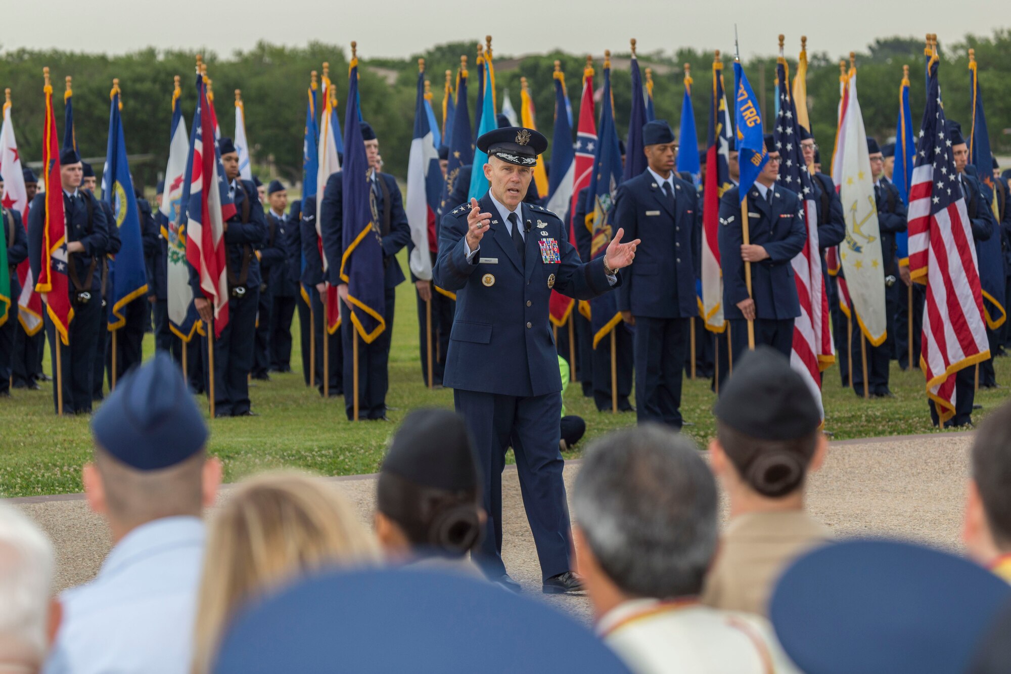 Lt. Gen. Steven L. Kwast, Commander of the Air Education and Training Command address the crowd at Joint Base San Antonio-Lackland, Texas during a basic military training graduation ceremony April 20, 2018. The ceremony also acknowledged the beginning of “Fiesta San Antonio,” the city’s annual festival held to honor the memory of the battles of the Alamo and San Jacinto. (U.S. Air Force photo by Ismael Ortega / Released)