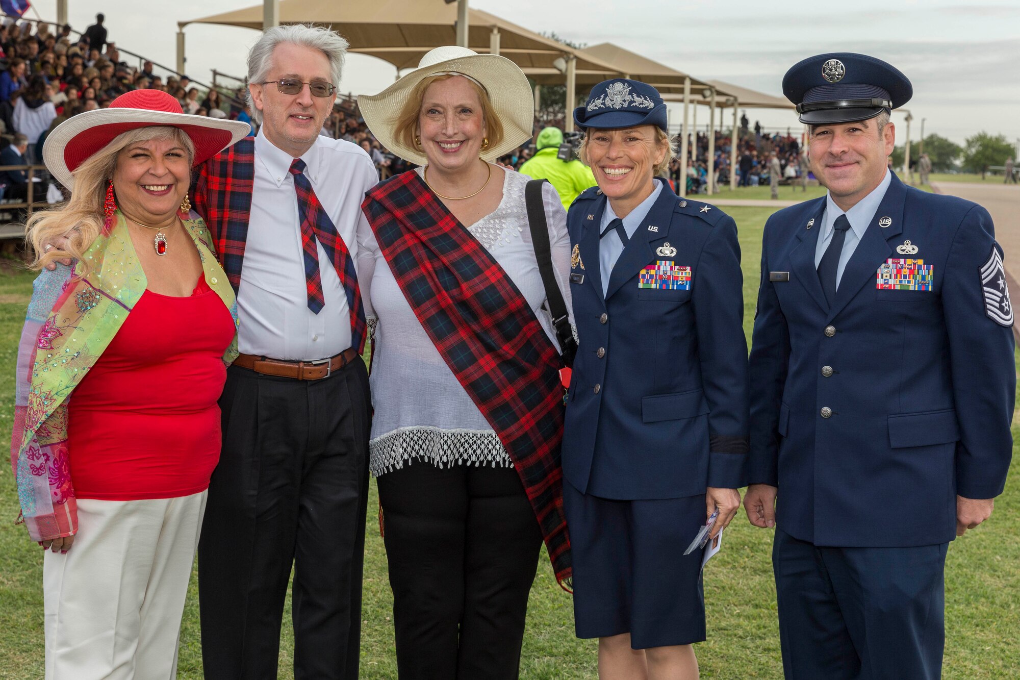 David Lackland (Inside Left) and his wife Eileen take a group photo at Joint Base San Antonio-Lackland, Texas after a basic military training graduation ceremony April 20, 2018. David is the cousin of Brig. Gen. Frank D. Lackland, the namesake of JBSA-Lackland. Today is the first time David and Eileen have viewed a BMT graduation. (U.S. Air Force photo by Ismael Ortega / Released)