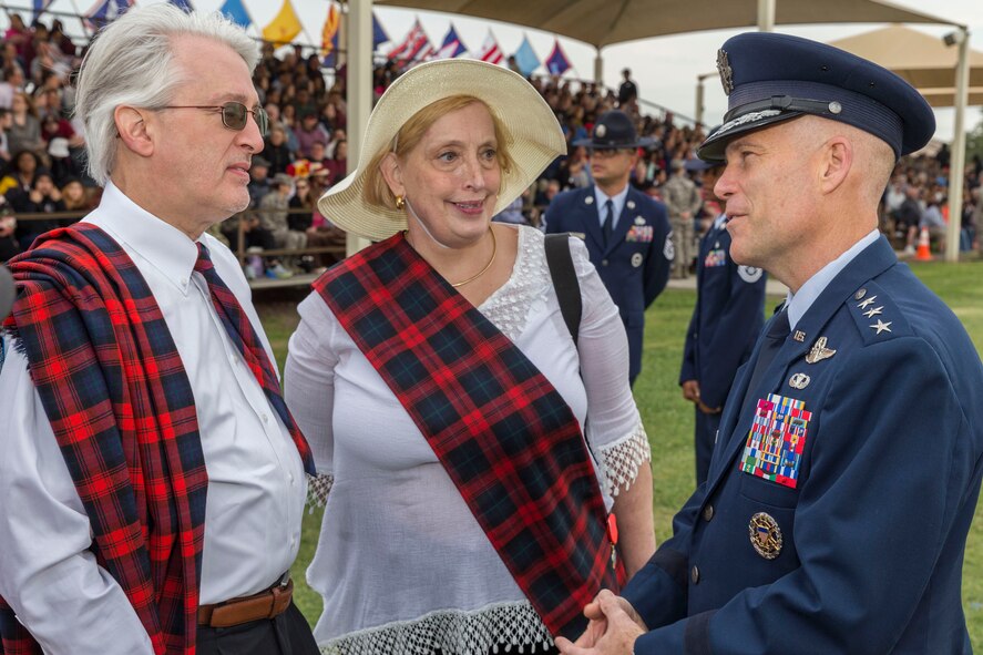 David Lackland (Left) and his wife Eileen are greeted by Lt. Gen. Steven L. Kwast (Right), Commander of the Air Education and Training Command at Joint Base San Antonio-Lackland, Texas during a basic military training graduation ceremony April 20, 2018. David is the cousin of Brig. Gen. Frank D. Lackland, the namesake of JBSA-Lackland. Today is the first time David and Eileen have viewed a BMT graduation. (U.S. Air Force photo by Ismael Ortega / Released)