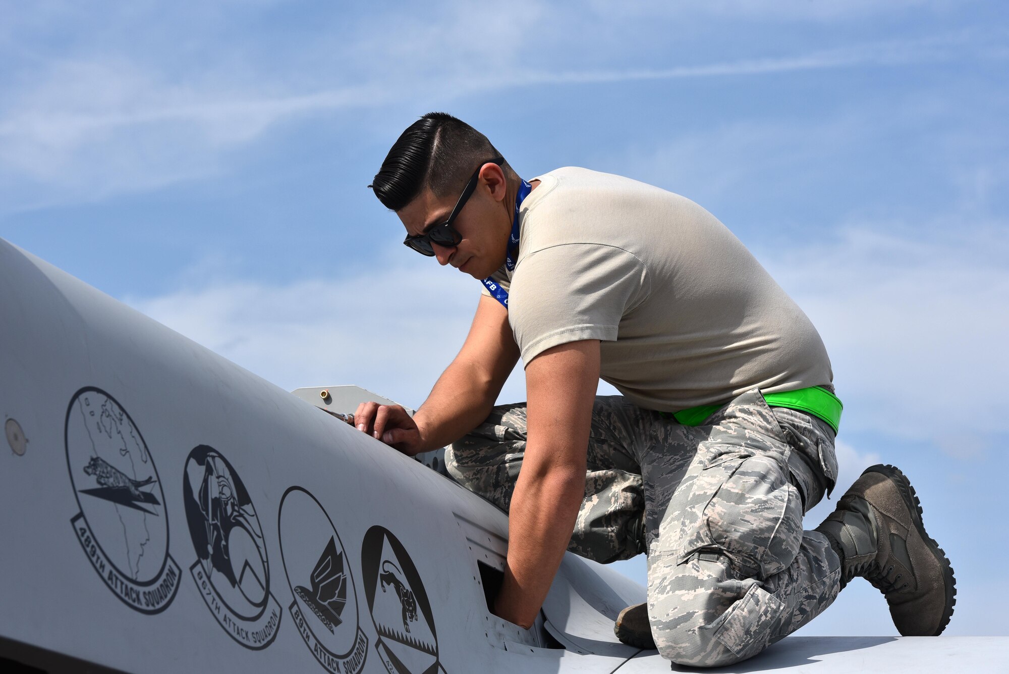 Airman 1st Class Anthony, assigned to the 432nd Aircraft Squadron, prepares the Air Force’s only MQ-9 Reaper model static for display for the Air and Space Expo season April 20, 2018 at Columbus Air Force, Mississippi. The build requires eight to ten maintenance Airmen and the appropriate equipment to complete. (U.S. Air Force photo by 1st Lt. Annabel Monroe)