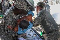 U.S. Soldiers from the 251st Area Support Medical Company, South Carolina Army National Guard, and the 231st Chemical Company, Maryland Army National Guard, are evaluated by U.S. Army North on their equipment setup time and proper decontamination and triaging during Guardian Response 18 on April 12, 2018, at Muscatatuck Urban Training Center, in Indiana. The exercise is linked to Vibrant Response 18 and is the multi-component ARNORTH annual disaster response exercise is designed to validate nearly 5,200 military and government civilian personnel in the event of a Chemical, Biological, Radiological and Nuclear (CBRN) disaster. (U.S. Army National Guard Photo by Sgt. Devon Bistarkey)