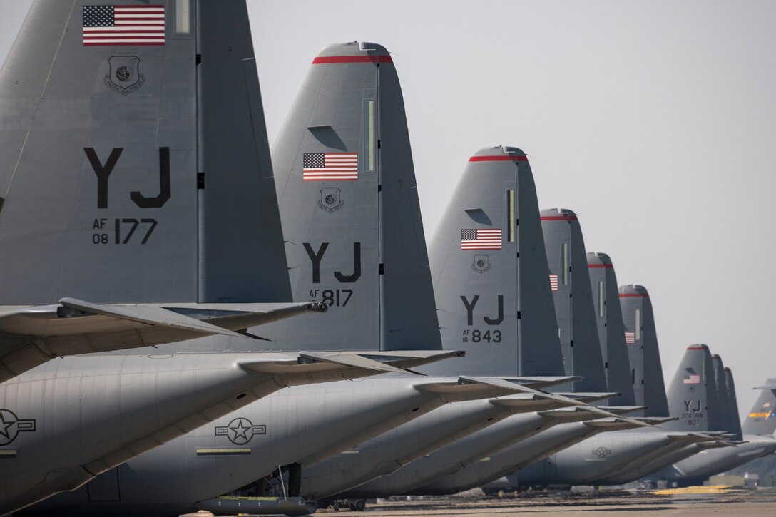 Air Force C-130J Super Hercules aircraft park on the flightline at Yokota Air Base, Japan