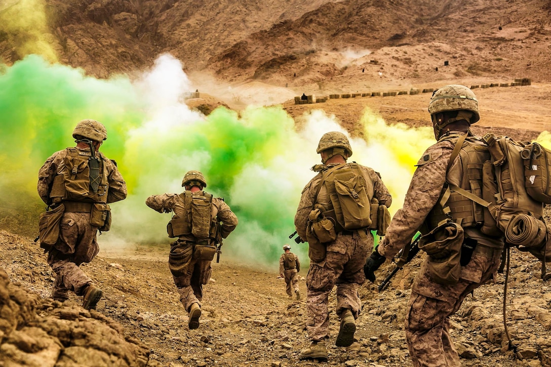 U.S. Marines assigned to Fox Company, Battalion Landing Team, 2nd Battalion, 6th Marine Regiment, 26th Marine Expeditionary Unit, run to firing positions during live-fire training in Jordan as part of Eager Lion 2018. Eager Lion is a capstone training engagement that provides U.S. forces and the Jordan Armed Forces an opportunity to rehearse operating in a coalition environment and to pursue new ways to collectively address threats to regional security and improve overall maritime security.