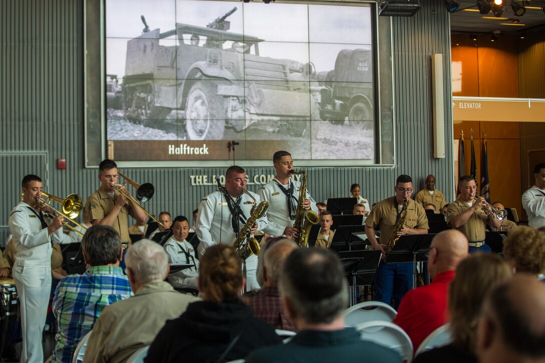 Marines with Marine Corps Jazz Band New Orleans accompanied by sailors from Navy Jazz Band Southeast out of Jacksonville, Florida, perform at the World War II Museum for Navy week in New Orleans, April 21, 2018. The celebration is an opportunity for citizens of New Orleans and surrounding areas to meet service members and witness the latest capabilities of today’s maritime service. (U.S. Marine Corps photo by Lance Cpl. Melany Vasquez/Released)